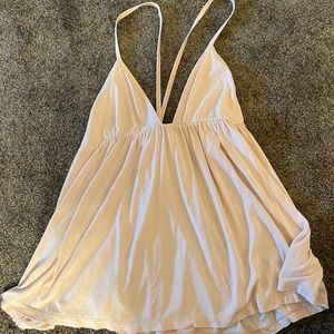 Free people tank top. Size small. Creamish light pink color